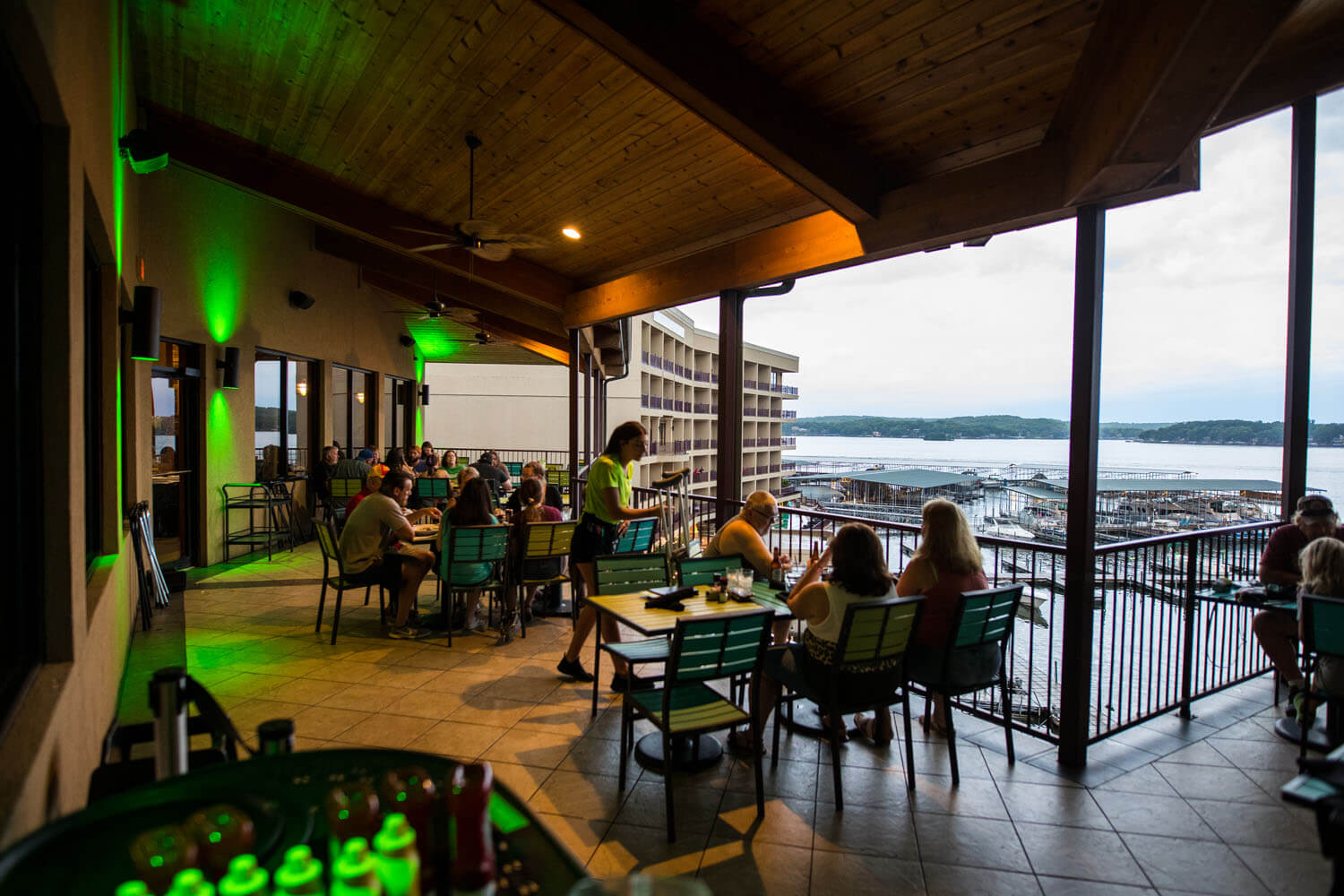 Patio seating facing the lake at H. Toad's Bar and Grill and Camden on the Lake Resort Lake of the Ozarks